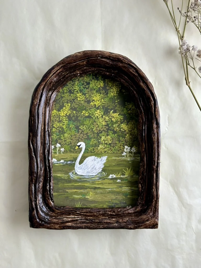 Swan in an Arch. Gouache on paper · Hand-built ceramic frame, artist's own